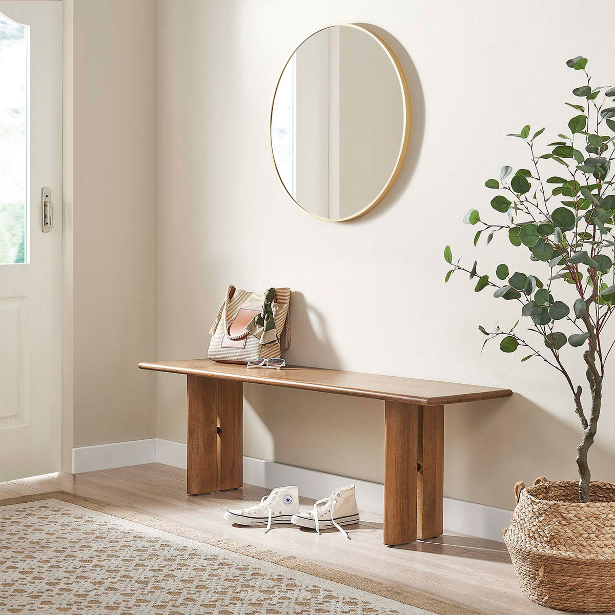 Simple lines and warm wood tone add inviting style to gathering spaces. || EEI-6344-WAL || front_room