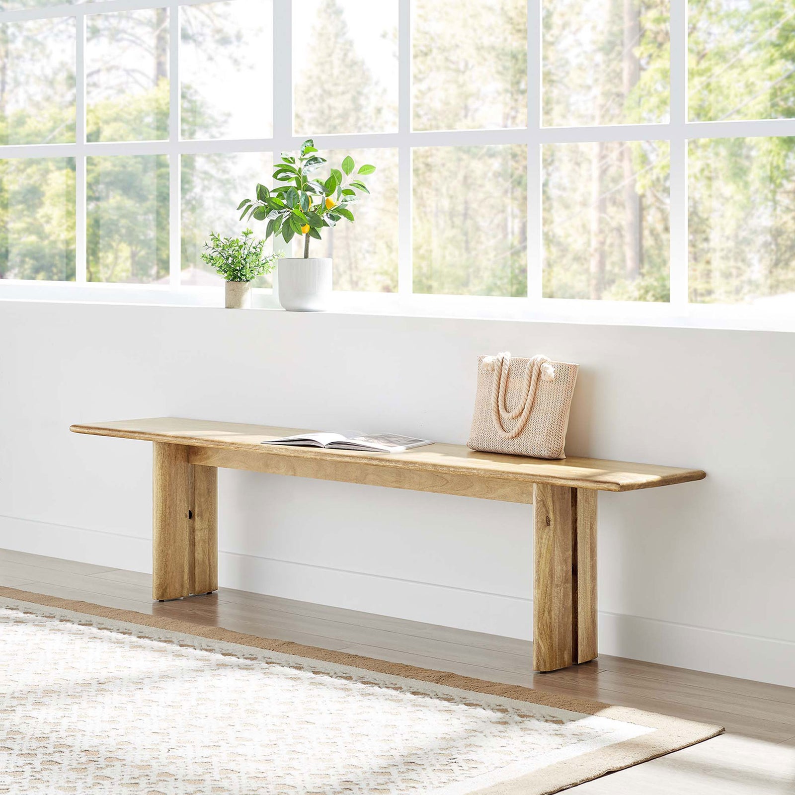 Sleek, extra-long bench lends natural elegance along a bright window. || EEI-6345-OAK || front_angle_room