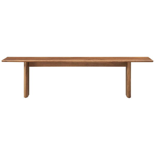 Extra-long mango wood bench finished in walnut with sculpted edges and sturdy pillar legs. || EEI-6345-WAL || front_studio