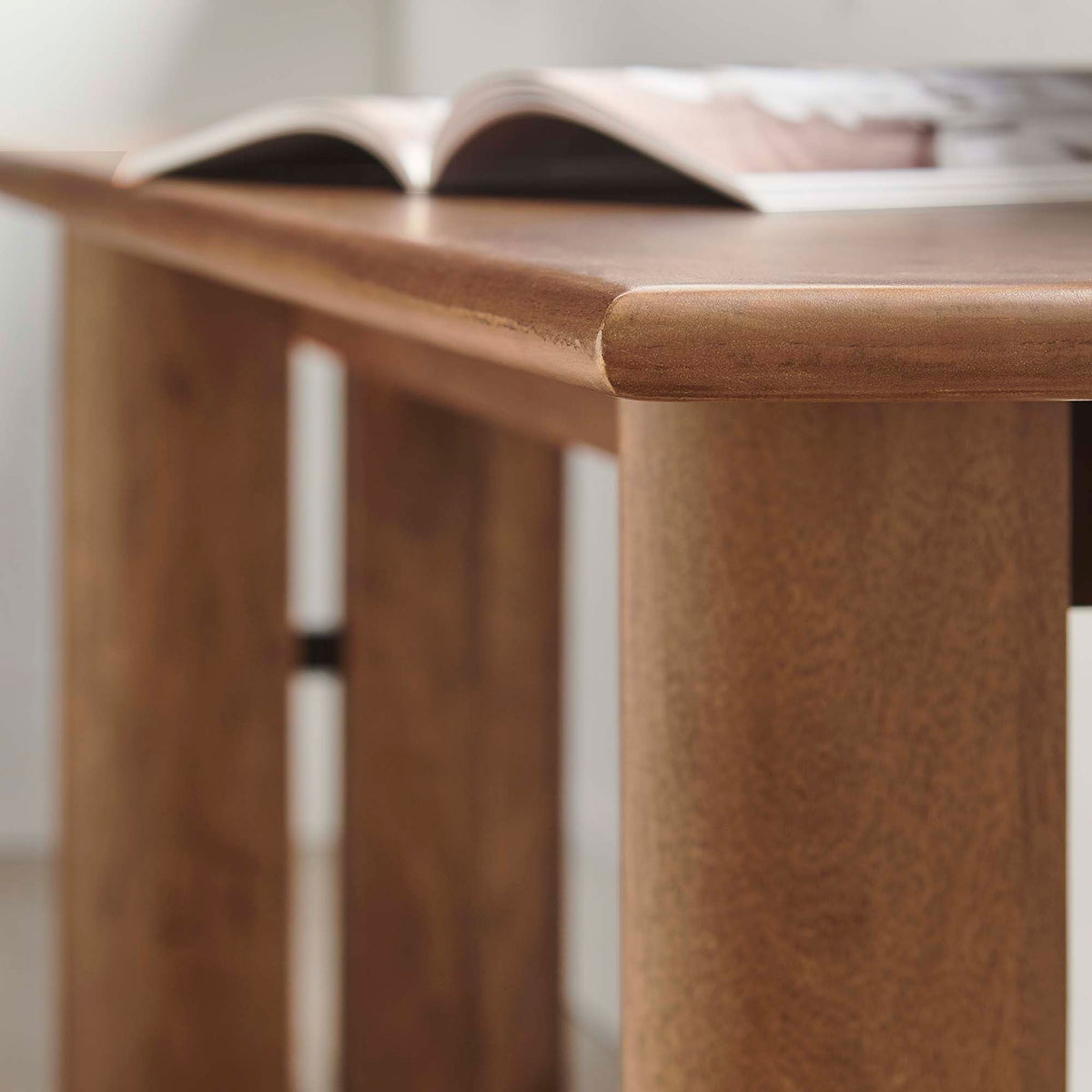 Smooth edge detail and refined finish emphasize comfort and craftsmanship. || EEI-6345-WAL || detail_room