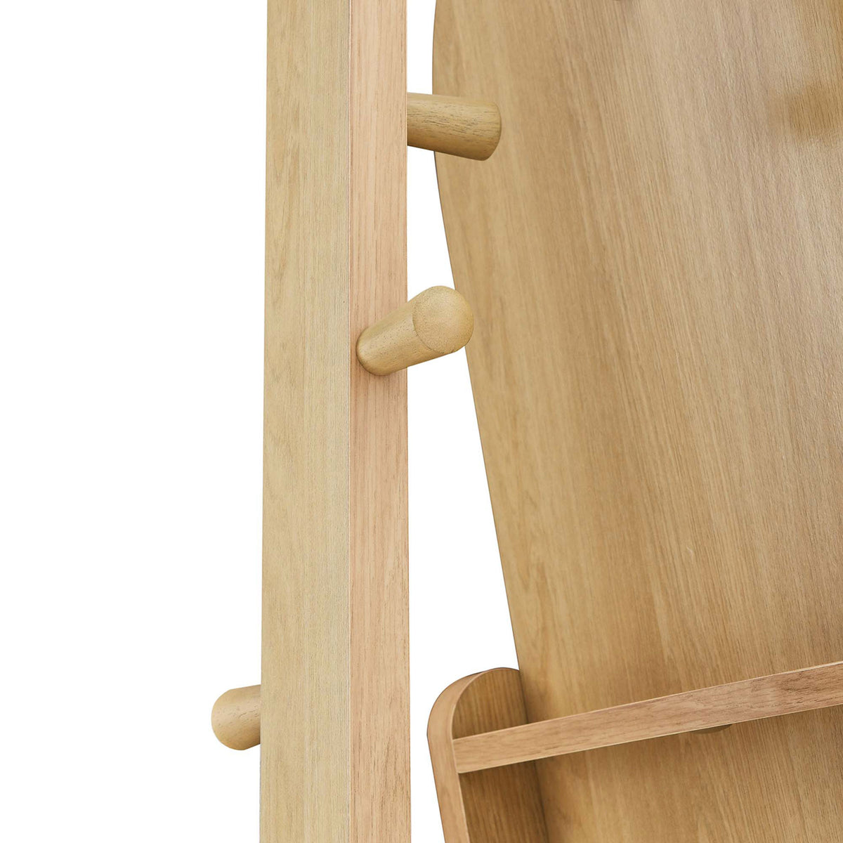 Rounded wooden pegs along the mirror frame offer convenient hanging space for coats and bags || EEI-6346-OAK || detail_studio