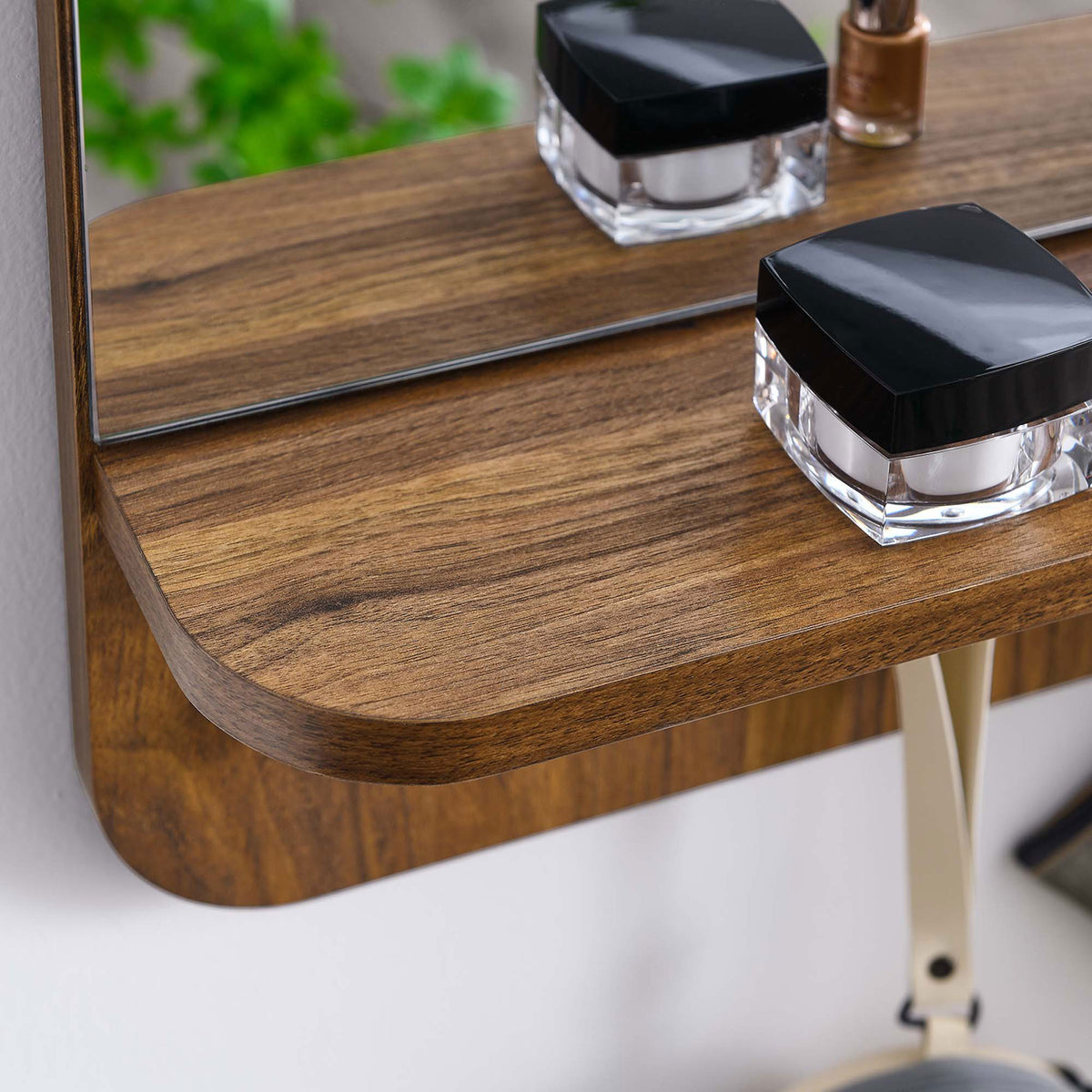 Walnut Lumina mirror shelf displaying beauty items and reflecting natural light from the window || EEI-6348-WAL || detail_room