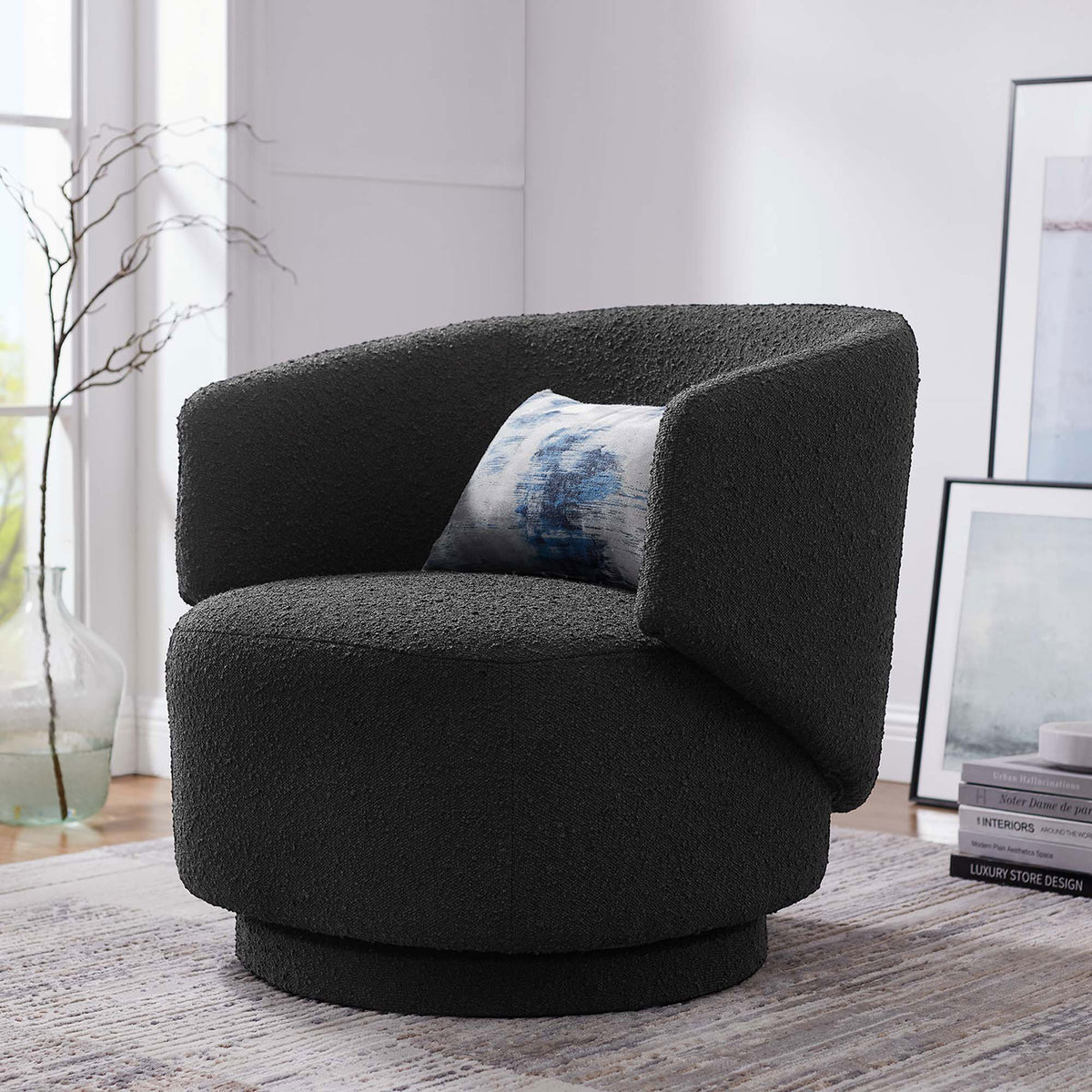 Modern swivel chair adds cozy texture and sculpted shape to your living space. || EEI-6357-BLK || front_angle_room