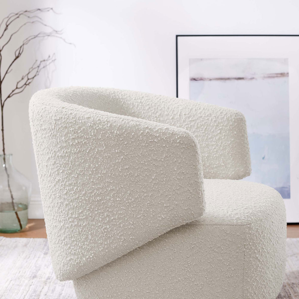 Textured boucle and sculpted arm bring inviting warmth and modern flair to your space. || EEI-6357-IVO || detail_room