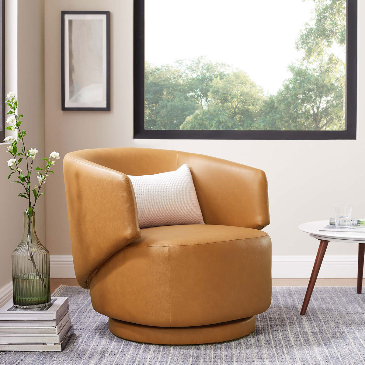 Inviting tan swivel chair with wraparound back and plush seat, perfect for modern living. || EEI-6358-TAN || front_angle_room