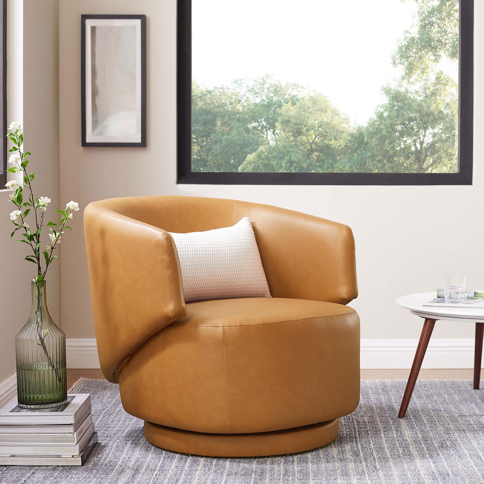 Inviting tan swivel chair with wraparound back and plush seat, perfect for modern living. || EEI-6358-TAN || front_angle_room