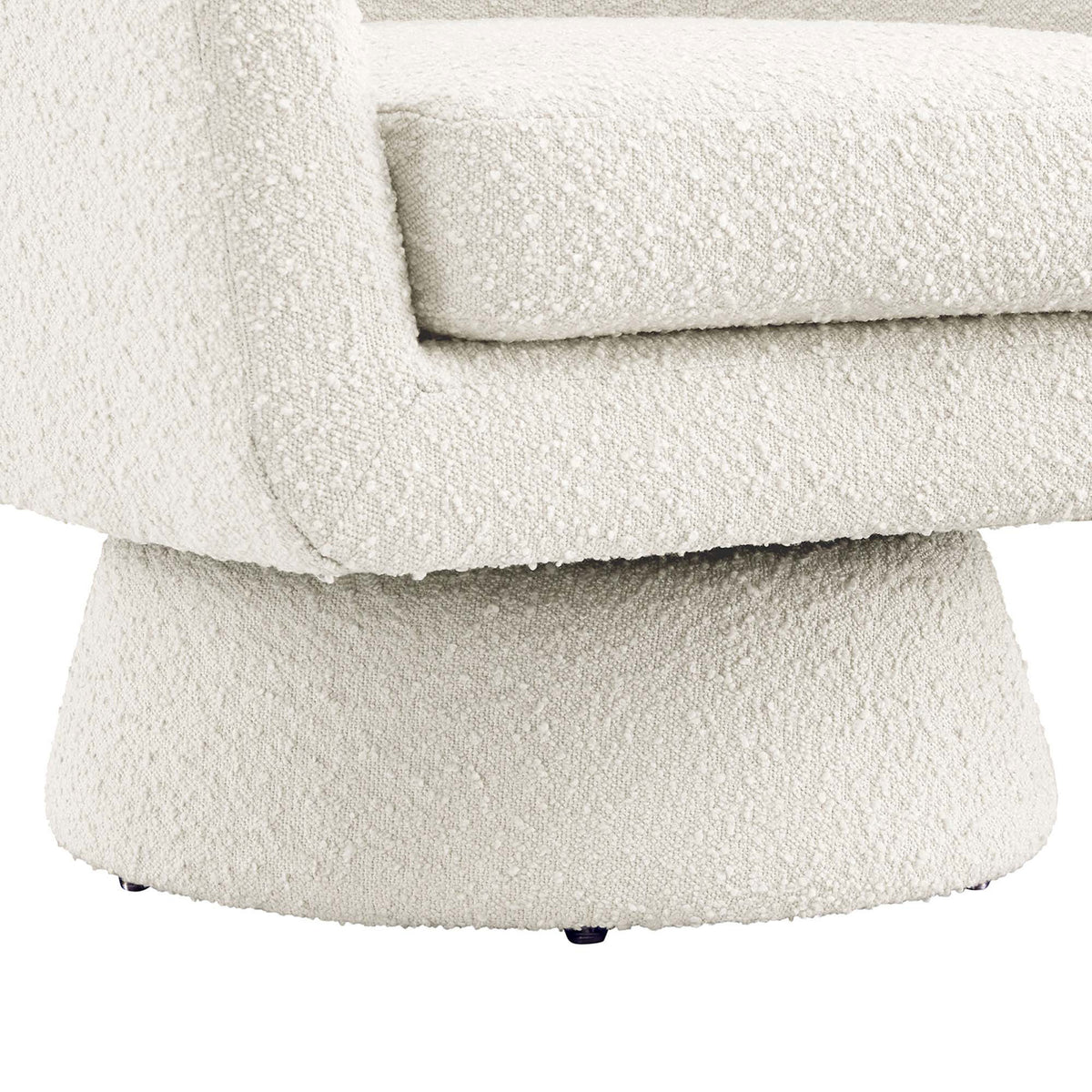 Tapered pedestal base provides stable, seamless swivel beneath the cozy textured boucle seat || EEI-6359-IVO || leg_studio