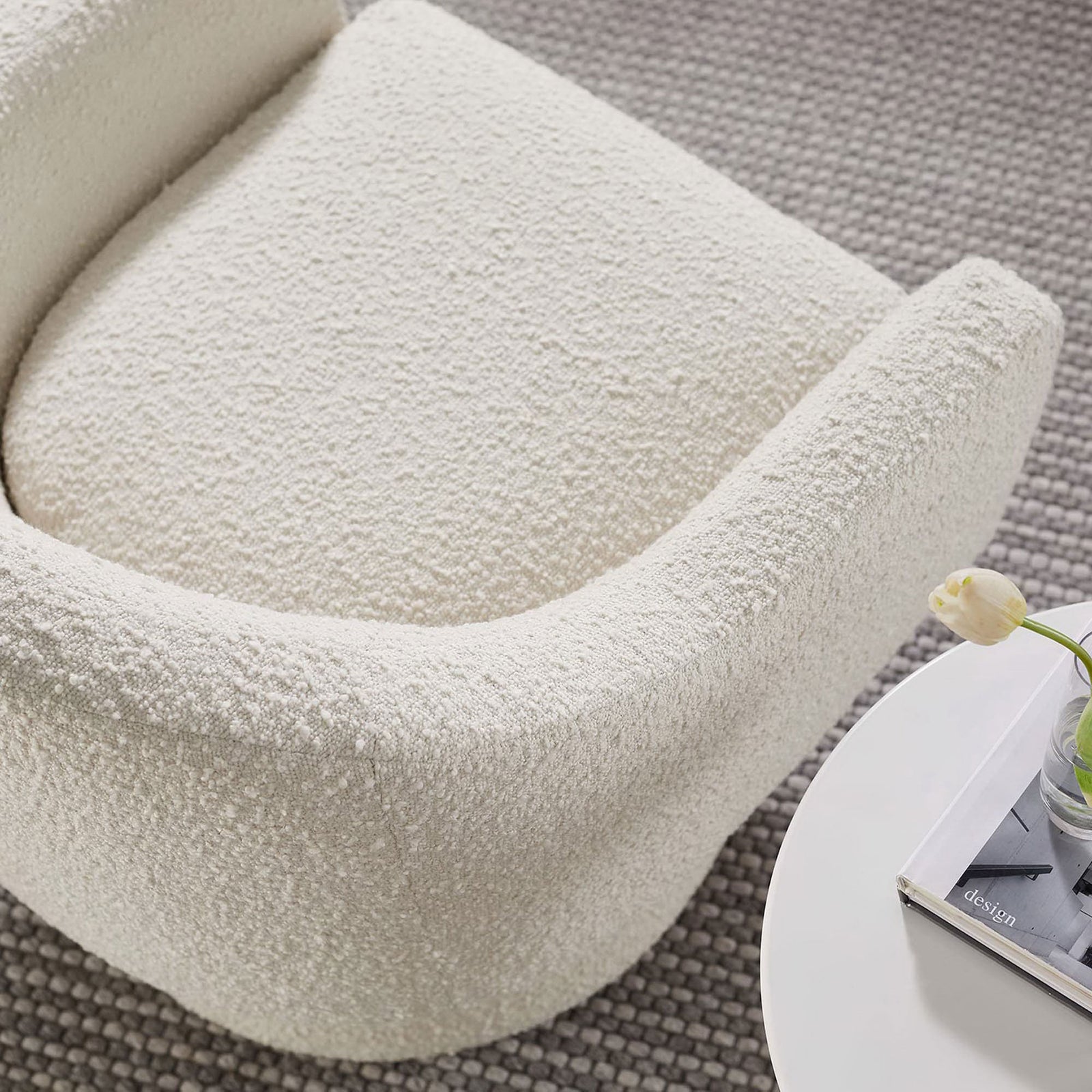Cozy, nubby boucle texture and generously padded seat invite relaxed lounging || EEI-6359-IVO || detail_room