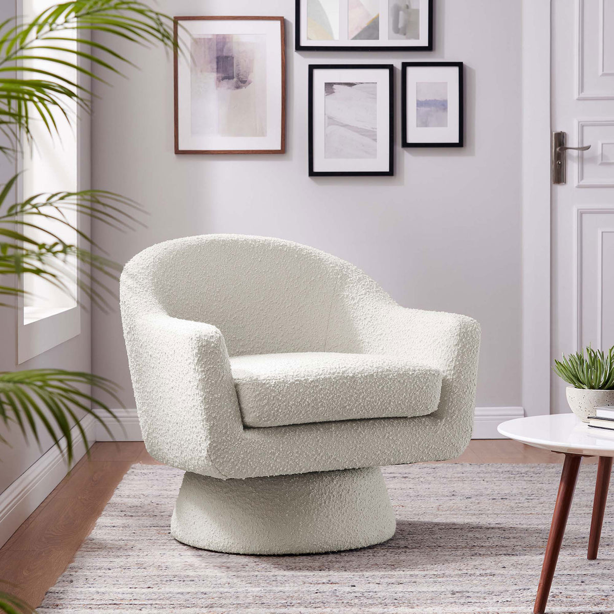 Modern ivory swivel chair adds soft texture and sculptural form to your living room || EEI-6359-IVO || front_angle_room