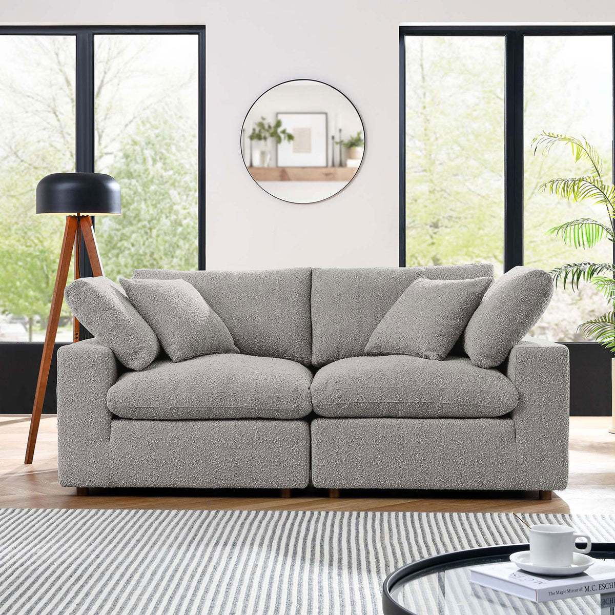 Light gray boucle loveseat anchors a bright modern living room with plush, lounge ready comfort || EEI-6361-LGR || front_room