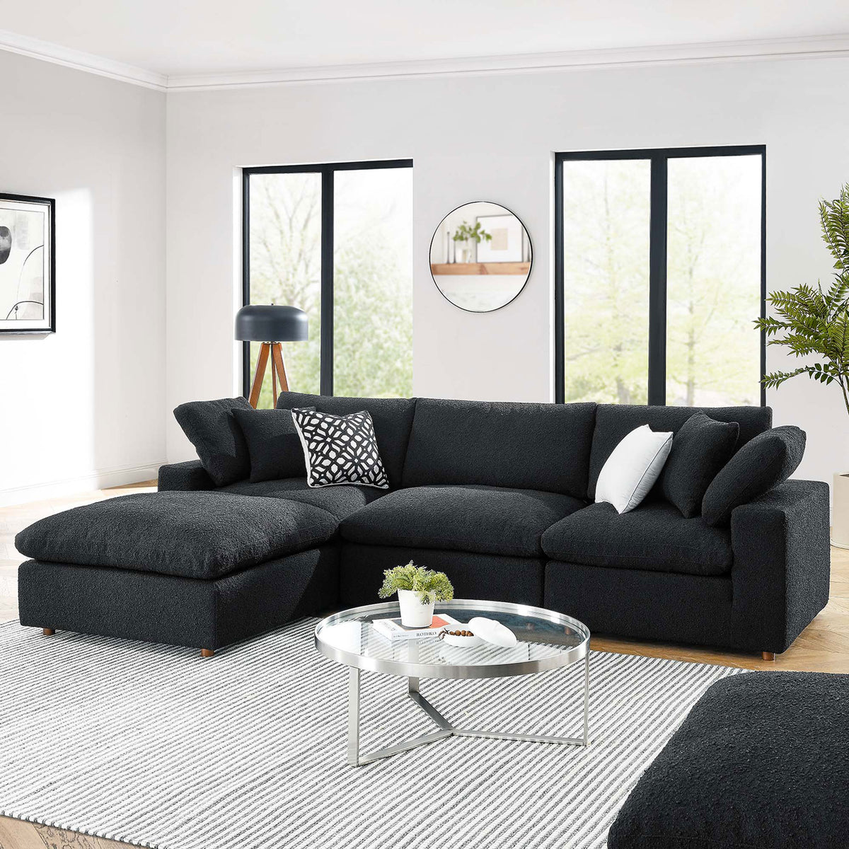 Black boucle sectional with chaise styled in a bright modern living room setting || EEI-6363-BLK || front_angle_room