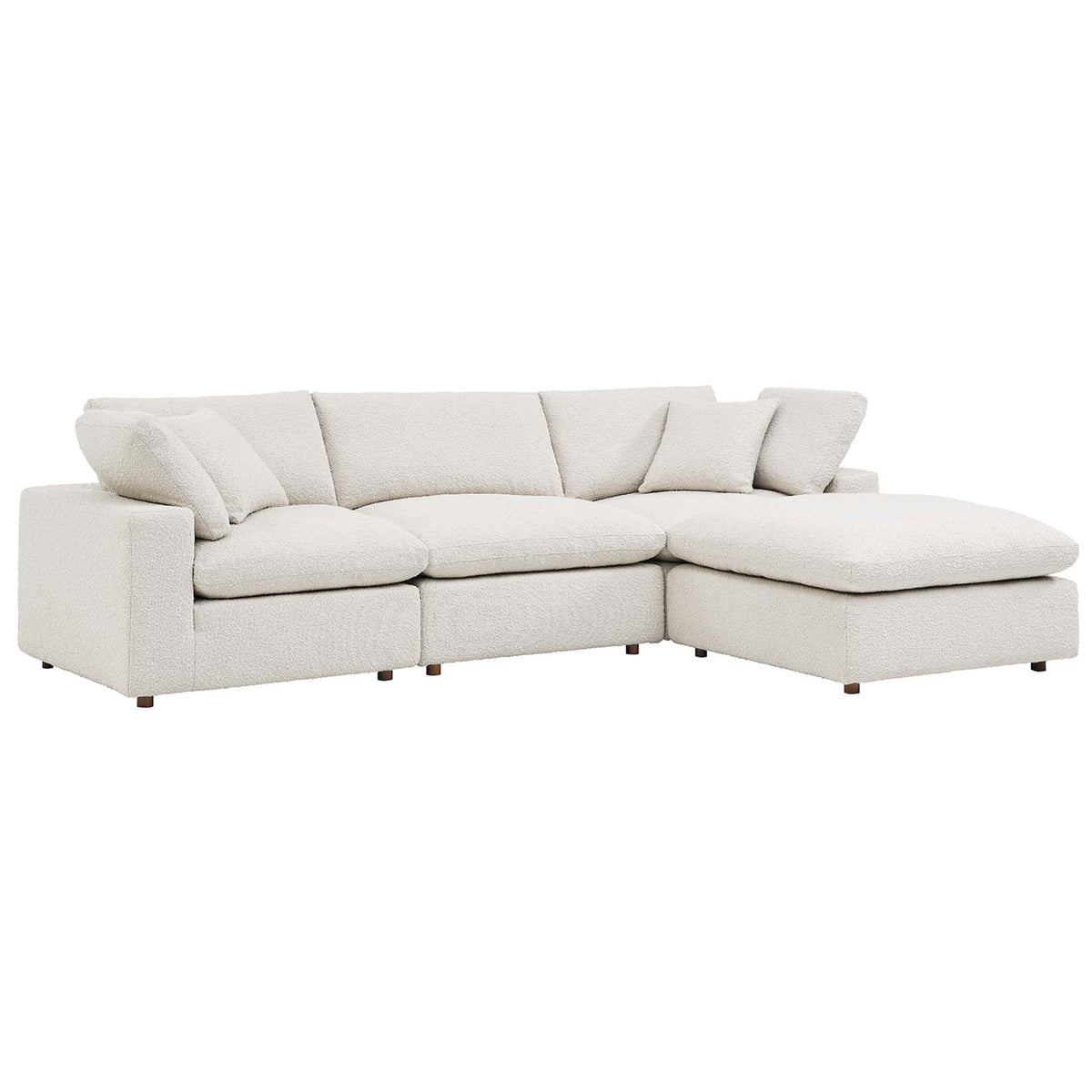 Low-profile ivory boucle sectional with deep overstuffed cushions and a roomy right chaise for relaxing || EEI-6363-IVO || front_angle_studio