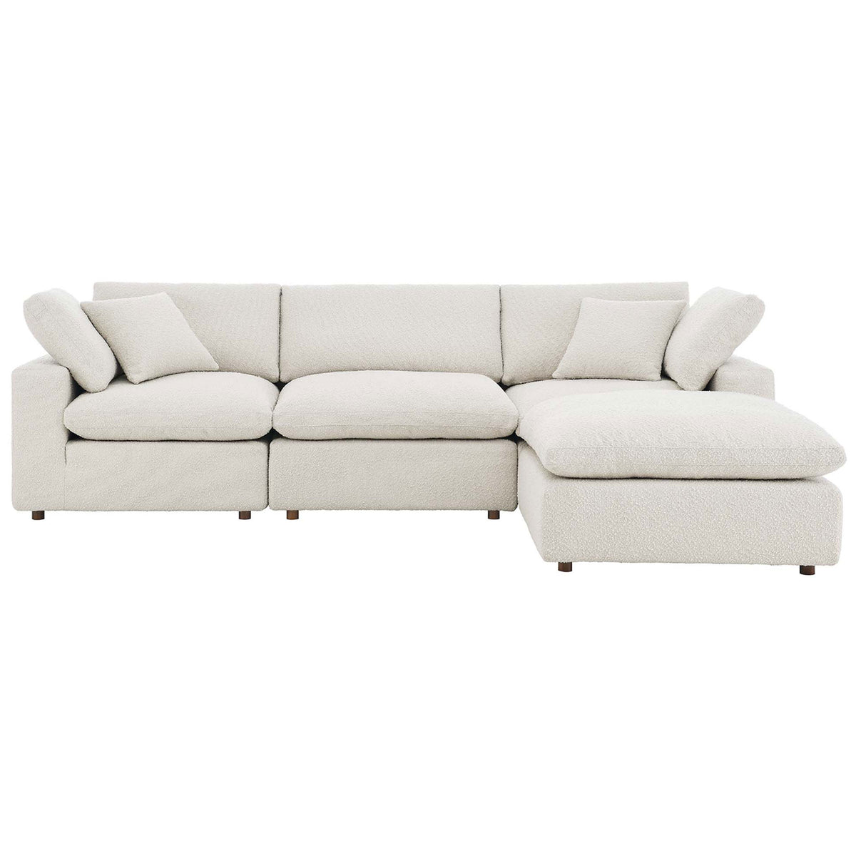 Spacious ivory boucle sectional with three plush seats and a right chaise for modern lounging comfort || EEI-6363-IVO || front_studio