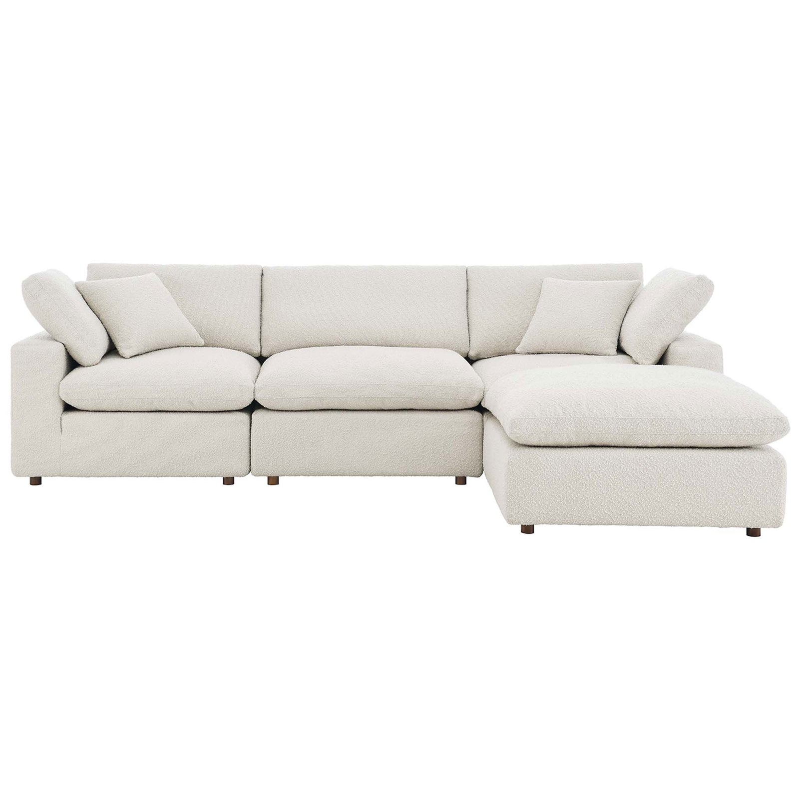 Spacious ivory boucle sectional with three plush seats and a right chaise for modern lounging comfort || EEI-6363-IVO || front_studio