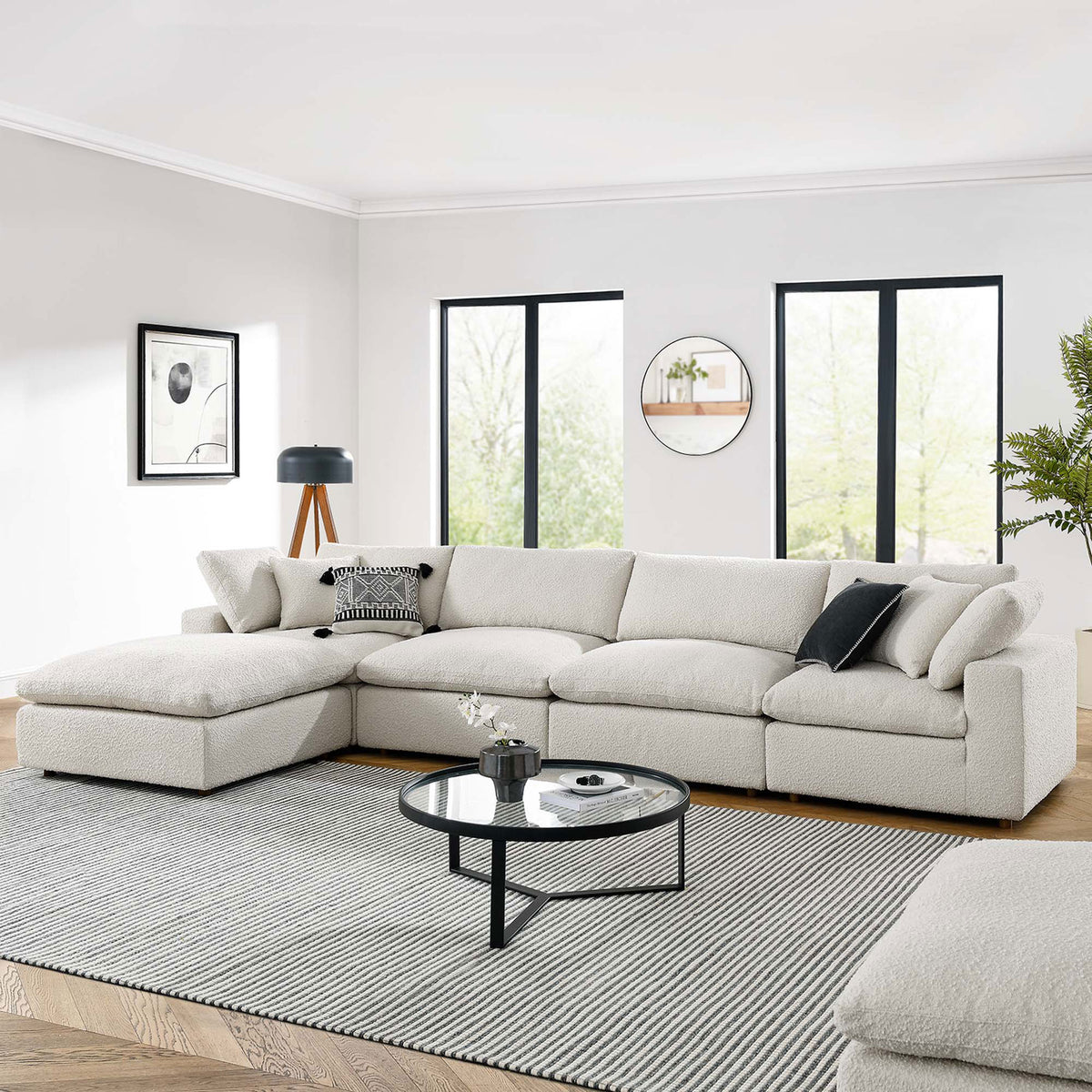 Spacious ivory boucle sectional sofa with chaise creating a cozy centerpiece in a bright living room || EEI-6365-IVO || front_angle_room