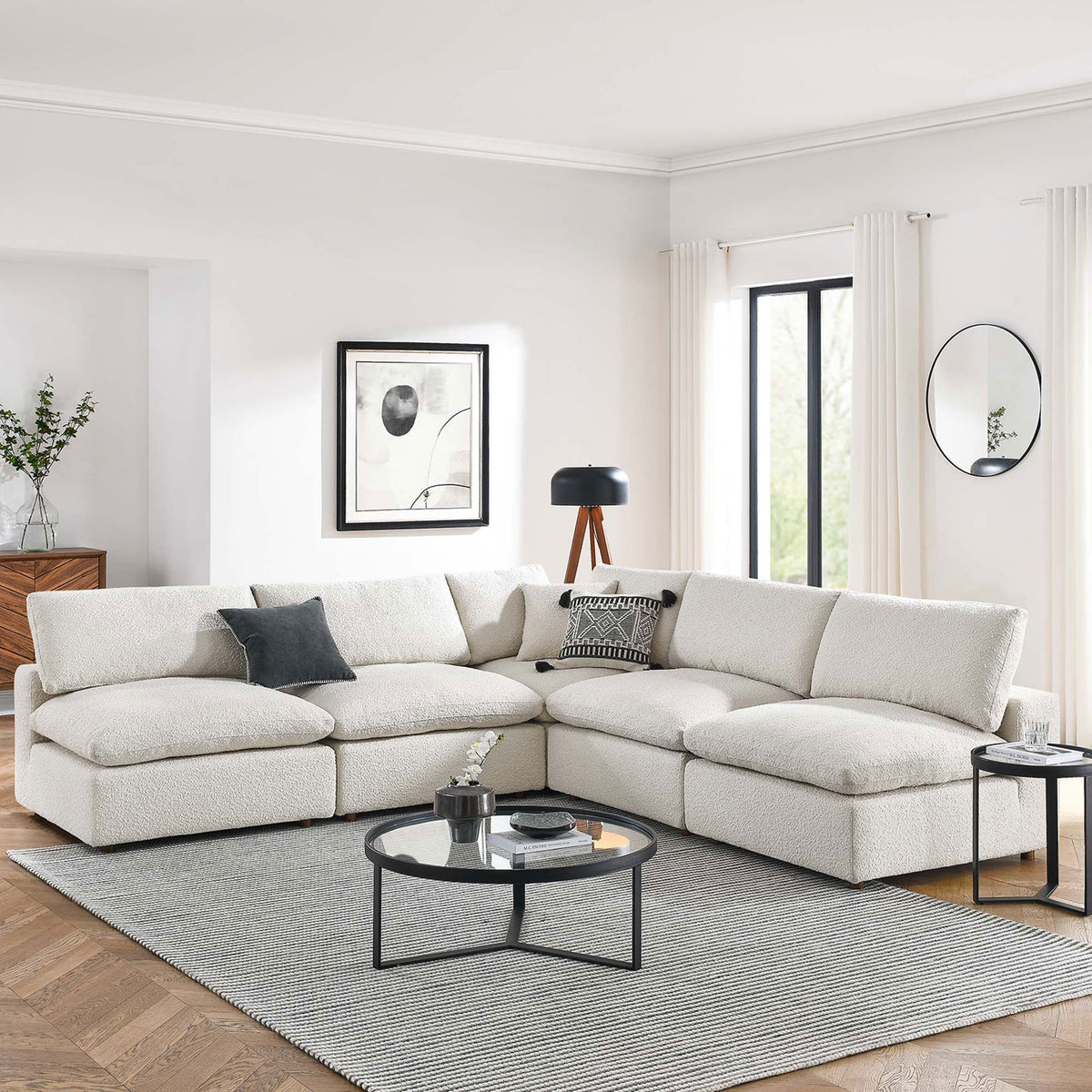 Ivory boucle sectional styled in a bright living room with pillows, rug, and modern decor || EEI-6367-IVO || front_angle_room