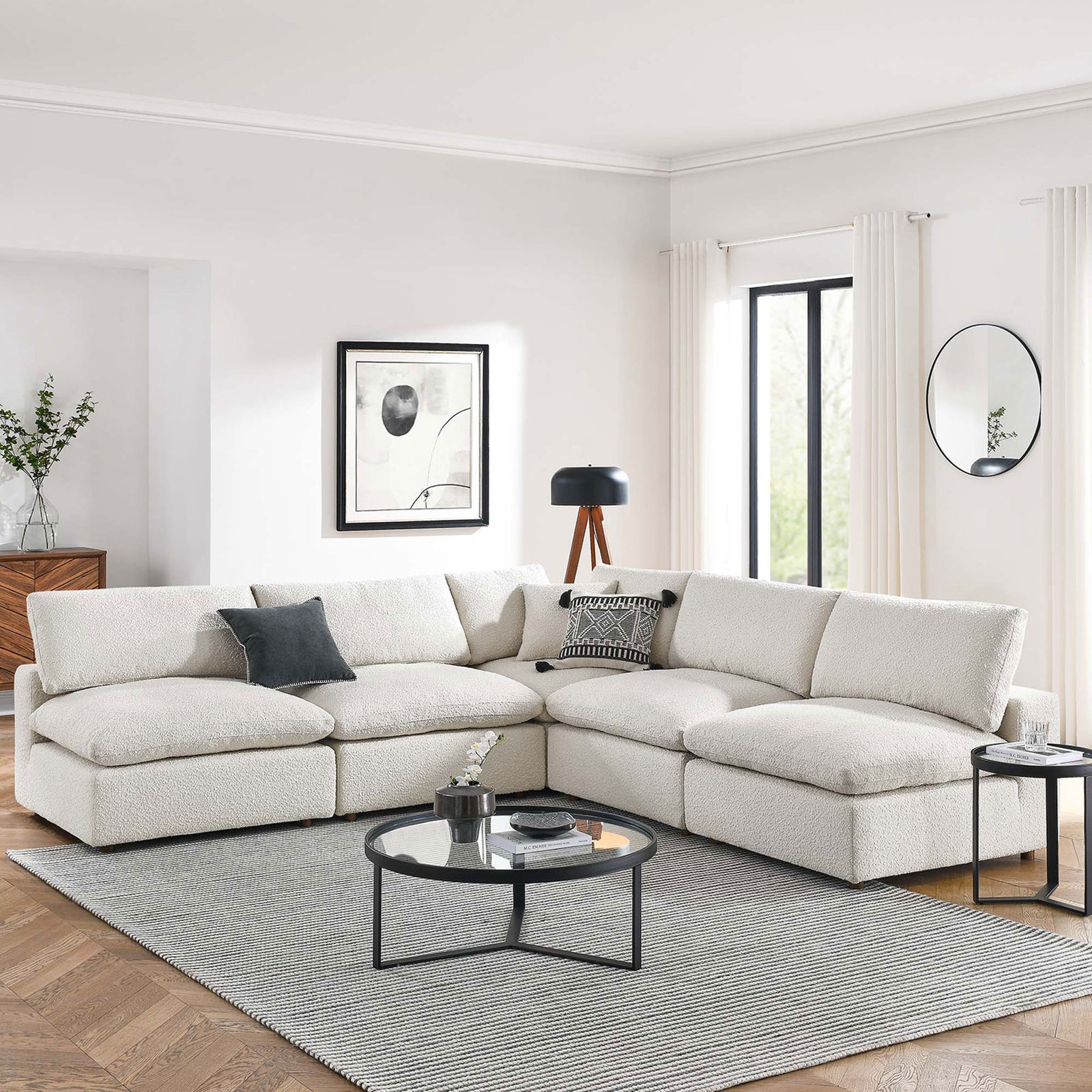 Ivory boucle sectional styled in a bright living room with pillows, rug, and modern decor || EEI-6367-IVO || front_angle_room