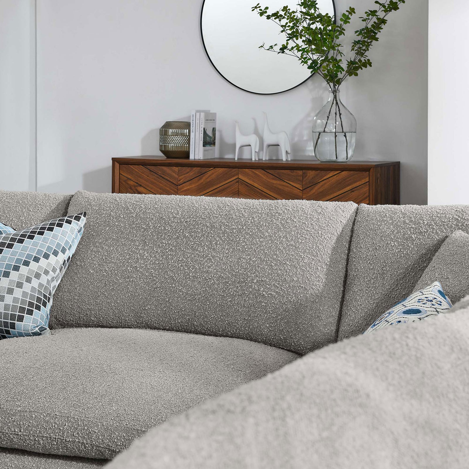 Commix sectional back cushions in light gray boucle adding cozy texture to a modern living room || EEI-6367-LGR || detail_room