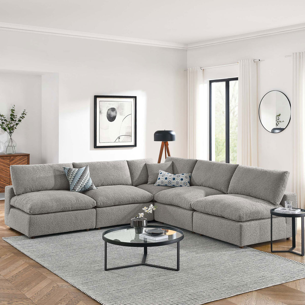 Commix light gray boucle sectional styled in a bright living room with modern decor and plenty of seating space || EEI-6367-LGR || front_angle_room