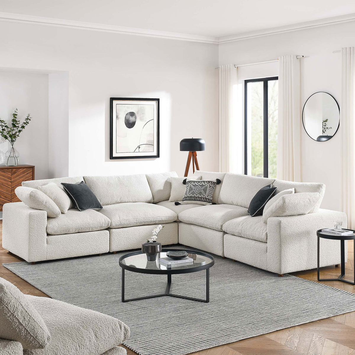 Inviting ivory boucle sectional anchors a bright living room with cozy pillows and a contemporary coffee table || EEI-6368-IVO || front_angle_room