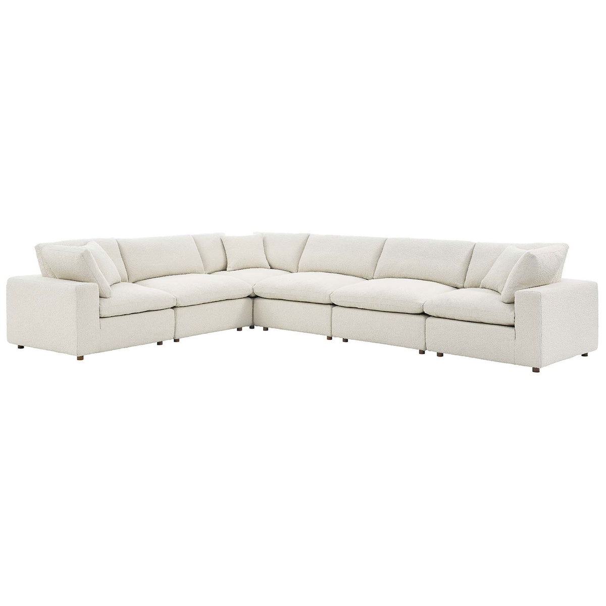 Spacious ivory boucle sectional with deep, overstuffed cushions and a low, lounge-ready profile || EEI-6369-IVO || front_angle_studio