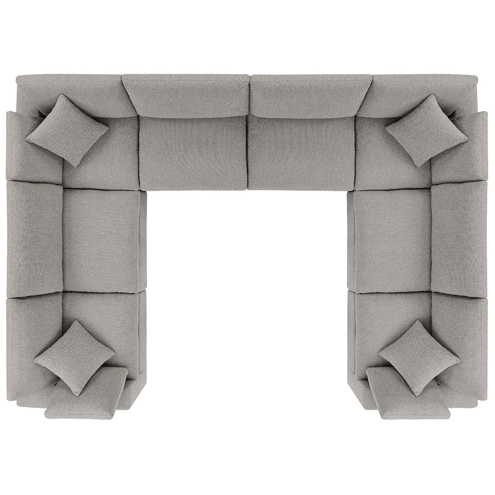 Top view highlighting the generous U-shaped layout and multiple plush pillows of this light gray sectional || EEI-6371-LGR || top_studio