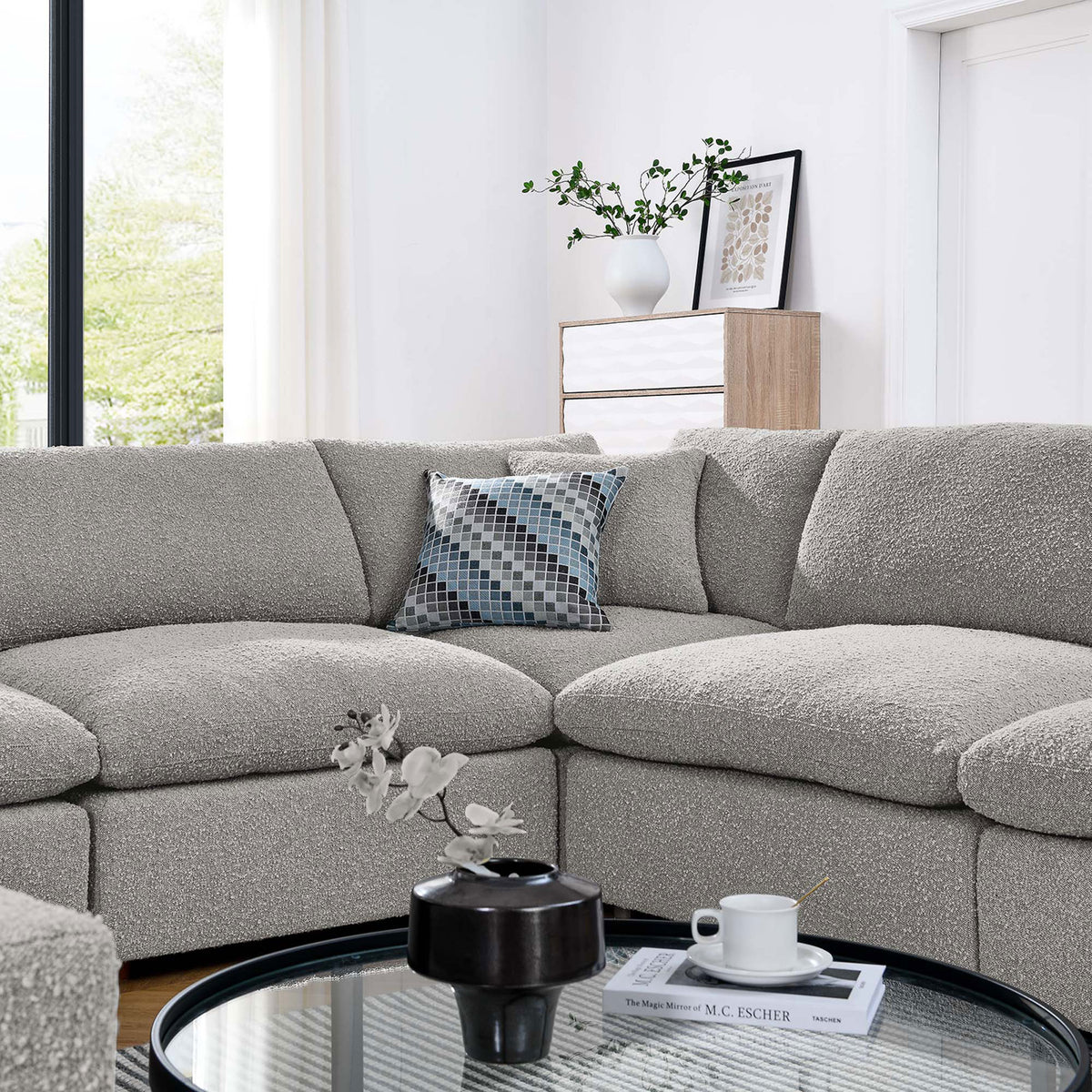 Inviting corner of the light gray boucle sectional styled with accent pillow and modern coffee table decor || EEI-6371-LGR || detail_room