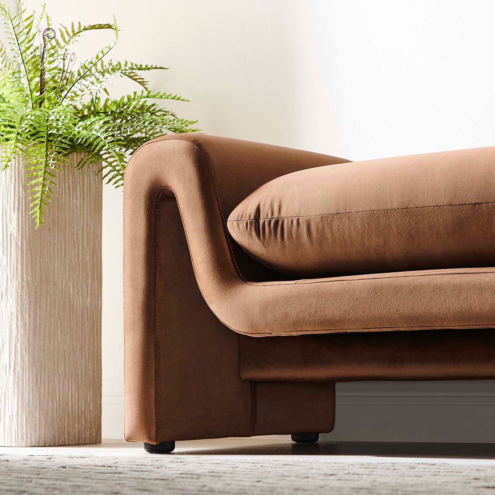 Velvety texture and rounded arm add warmth and modern curves to your space || EEI-6380-BRN || detail_room