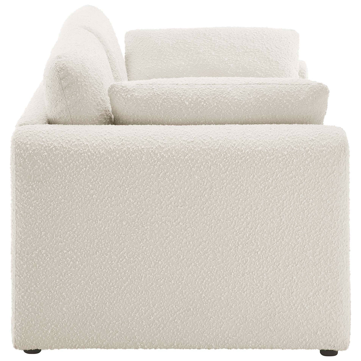 Sleek low-profile ivory sofa with boucle upholstery and thick back cushions for everyday comfort. || EEI-6381-IVO || side_studio