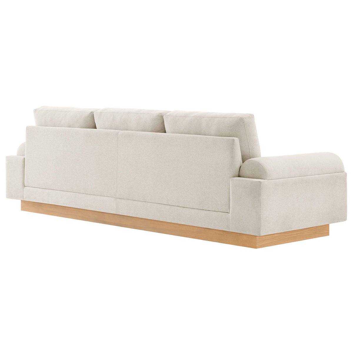 Oasis upholstered sofa featuring a smooth tailored back and extended wood plinth base || EEI-6401-IVO || back_angle_studio