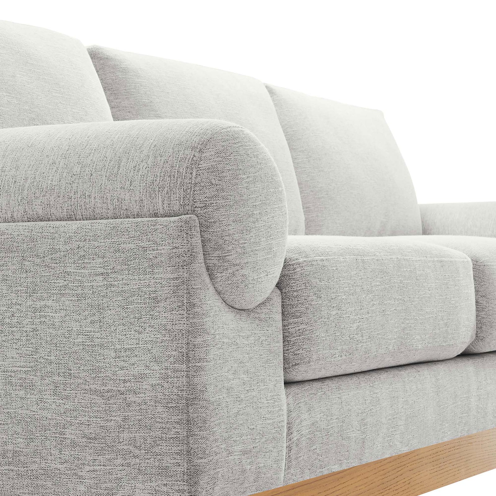 Rounded bolster arm and textured light gray fabric bring soft, inviting comfort to the Oasis sofa || EEI-6401-LGR || detail_studio