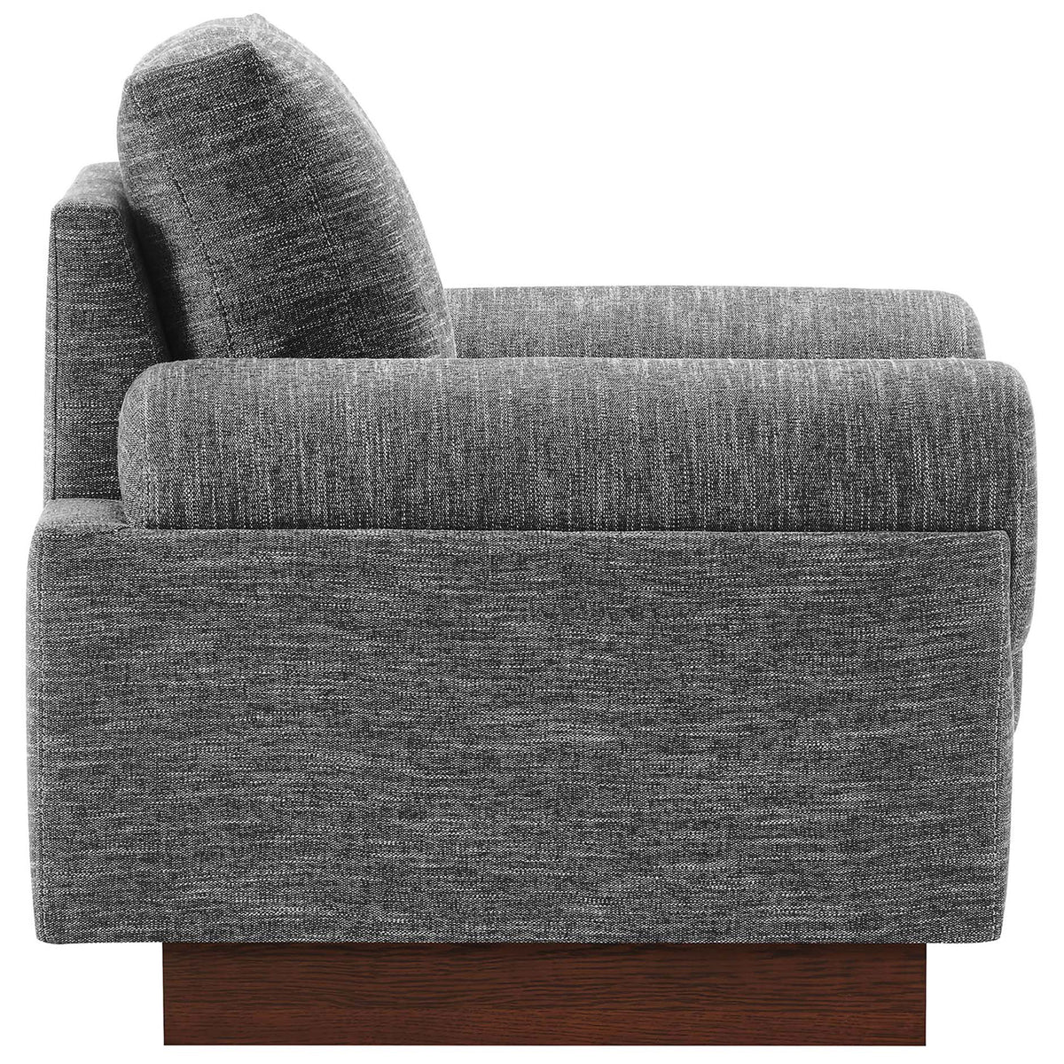 Streamlined profile with thick seat cushion, cylindrical arm, and low wood platform base || EEI-6402-GRY || side_studio