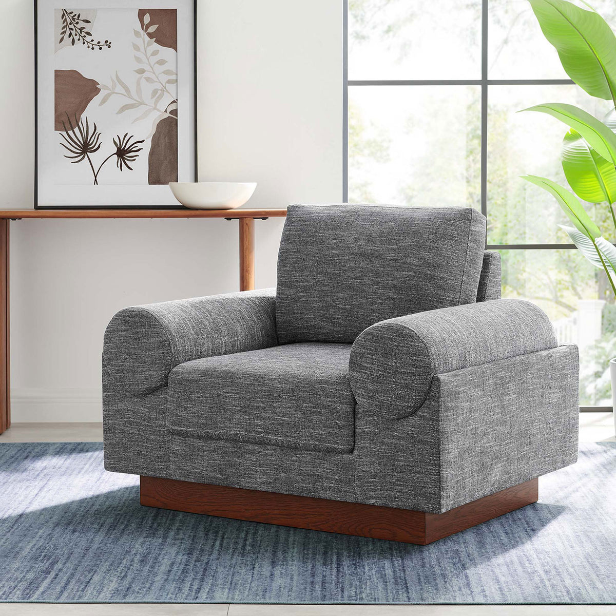 Designed to elevate spaces with gray textured fabric and a wood plinth base that adds warmth || EEI-6402-GRY || front_angle_room