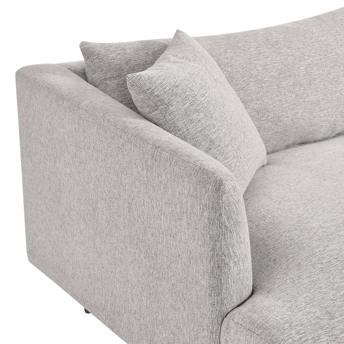 Sofa arm and cushion highlight the soft light gray upholstery and gently rounded silhouette || EEI-6405-HLG || detail_studio
