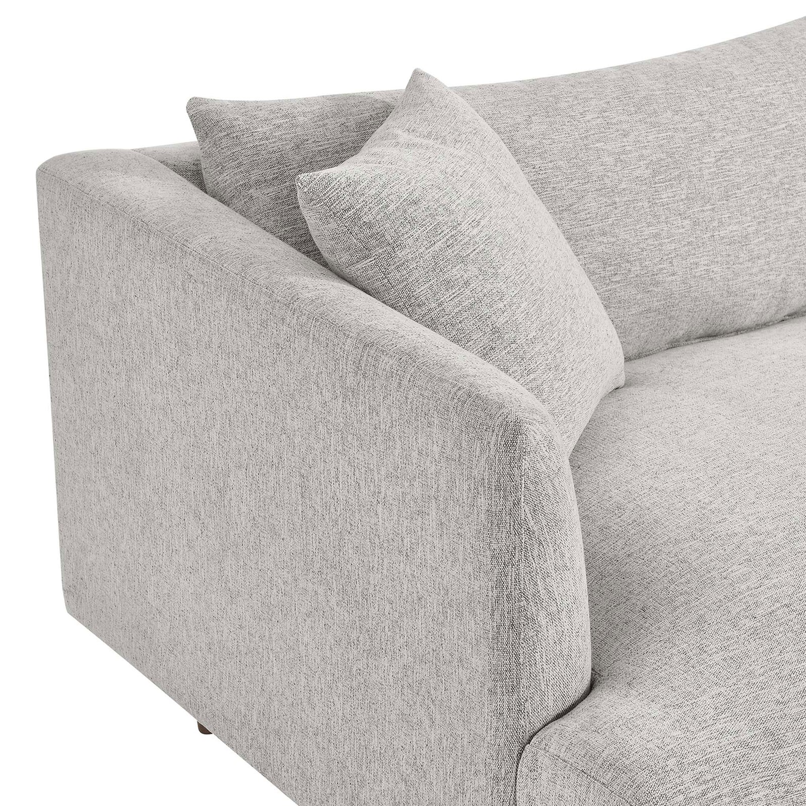Sofa arm and cushion highlight the soft light gray upholstery and gently rounded silhouette || EEI-6405-HLG || detail_studio
