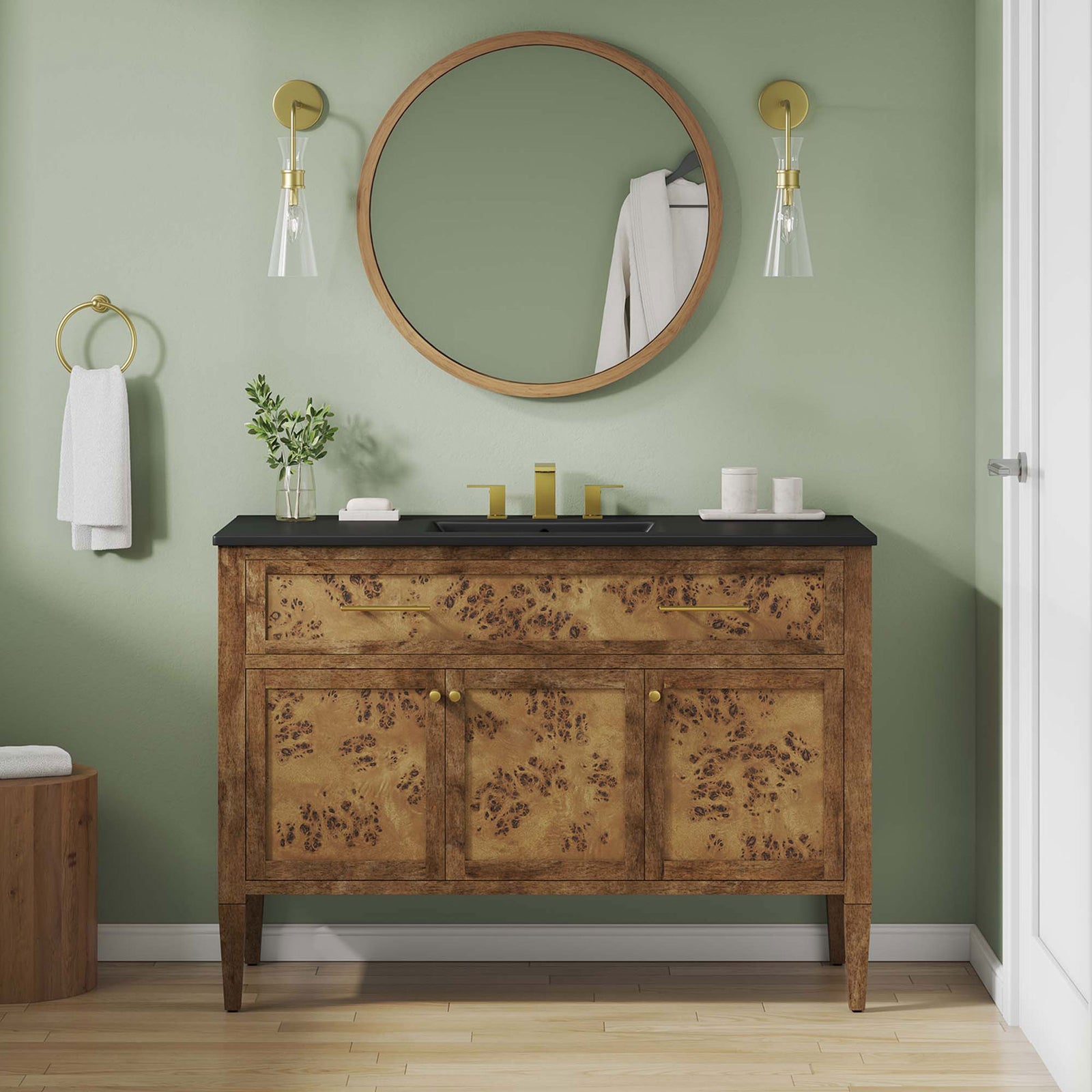 Warm burl wood vanity with black sink and brass accents elevates a modern bath. || EEI-6453-BLK-BRN || front_room