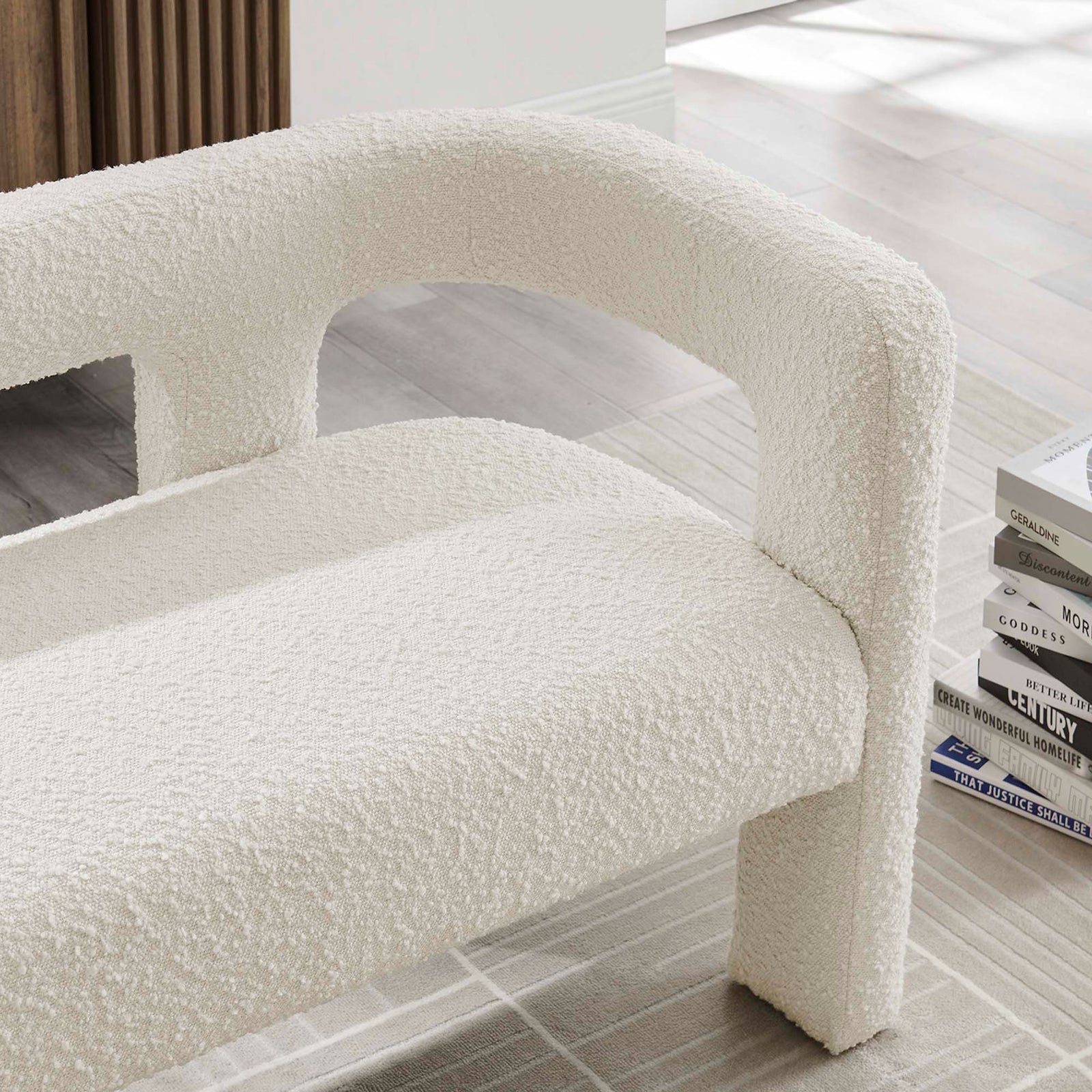 Ivory boucle loveseat arm and seat bringing soft texture to a light, contemporary living space || EEI-6477-IVO || detail_room