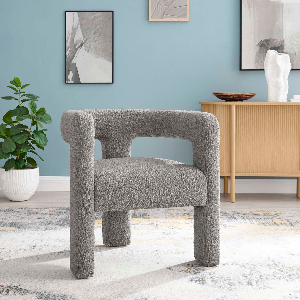 Compact light gray boucle armchair with open back and rounded arms for a cozy modern look || EEI-6479-LGR || front_room