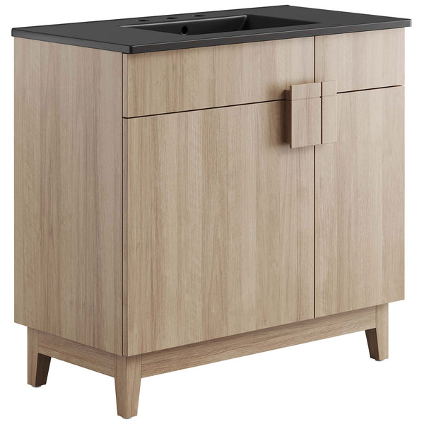 Spacious 36-inch vanity with black ceramic basin, split square handle, and airy tapered legs. || EEI-6485-BLK-OAK || front_angle_studio