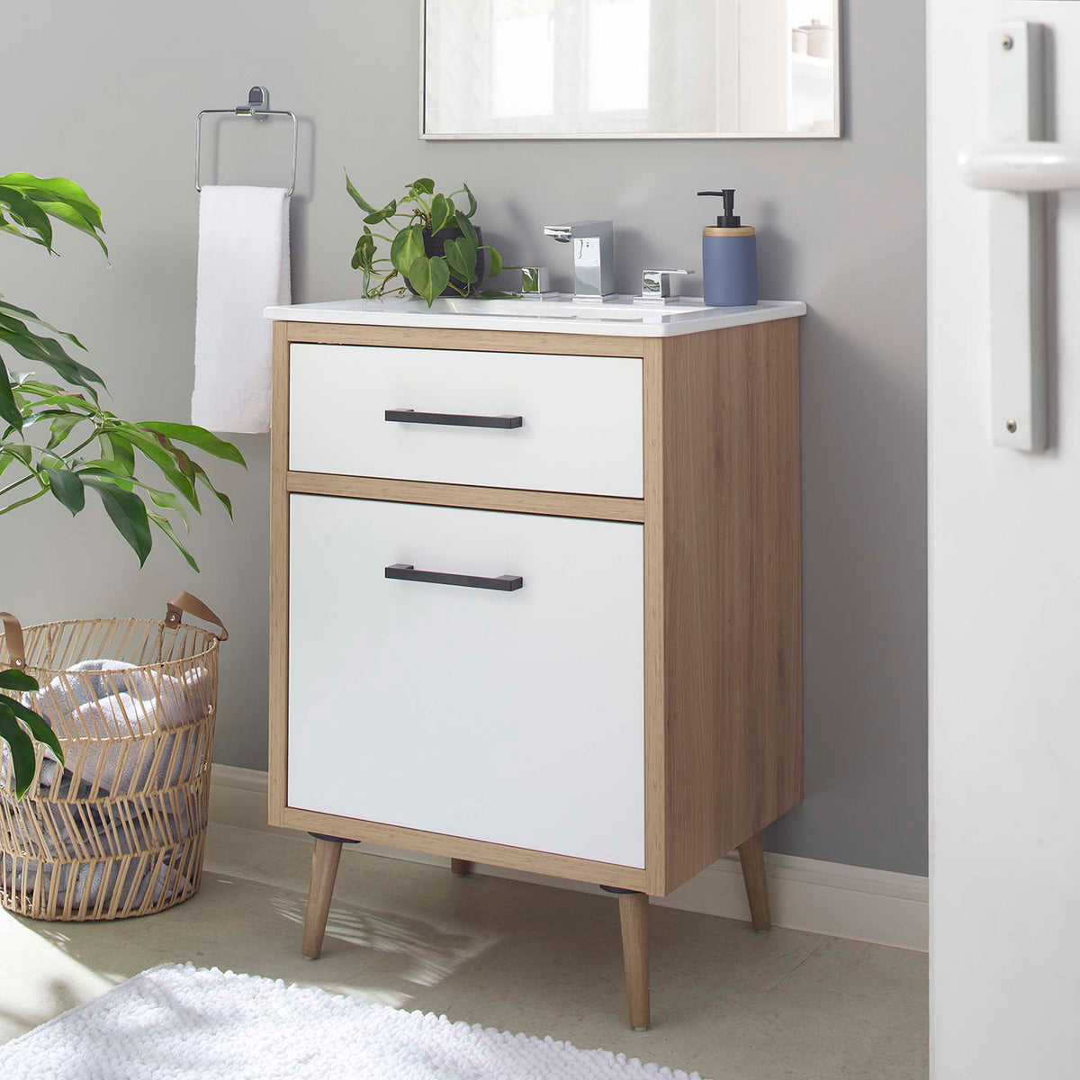 Modern white oak vanity elevates the bath with clean lines and mid-century charm || EEI-6498-WHI-OAK || front_angle_room