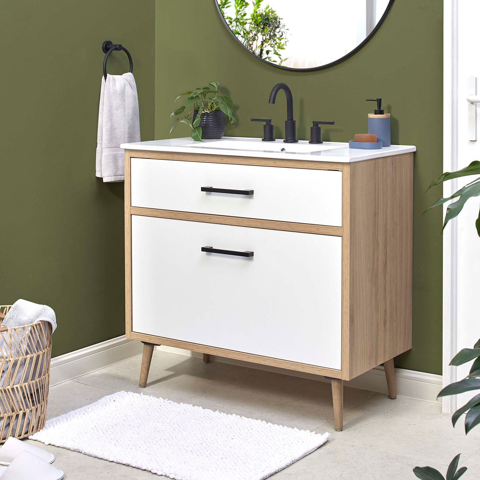 Sleek 36-inch vanity anchors the bath with warm wood tones and modern lines || EEI-6500-WHI-OAK || front_angle_room