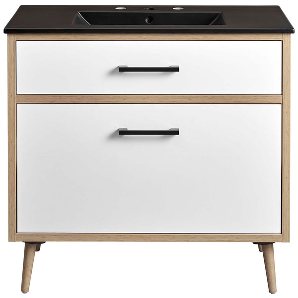Roomy 36 inch vanity with black countertop, white drawers, and oak finish on tapered legs || EEI-6501-BLK-OAK || front_studio