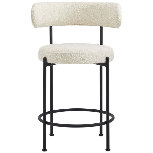 Plush boucle upholstery pairs with a minimalist black metal frame. || EEI-6518-IVO-BLK || front_studio