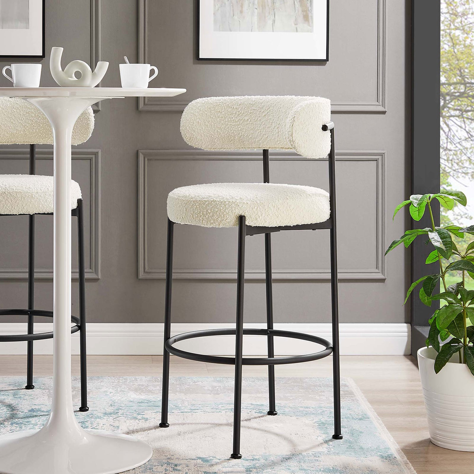 Bar stool adds cozy boucle and modern geometry to the bar table. || EEI-6520-IVO-BLK || front_angle_room