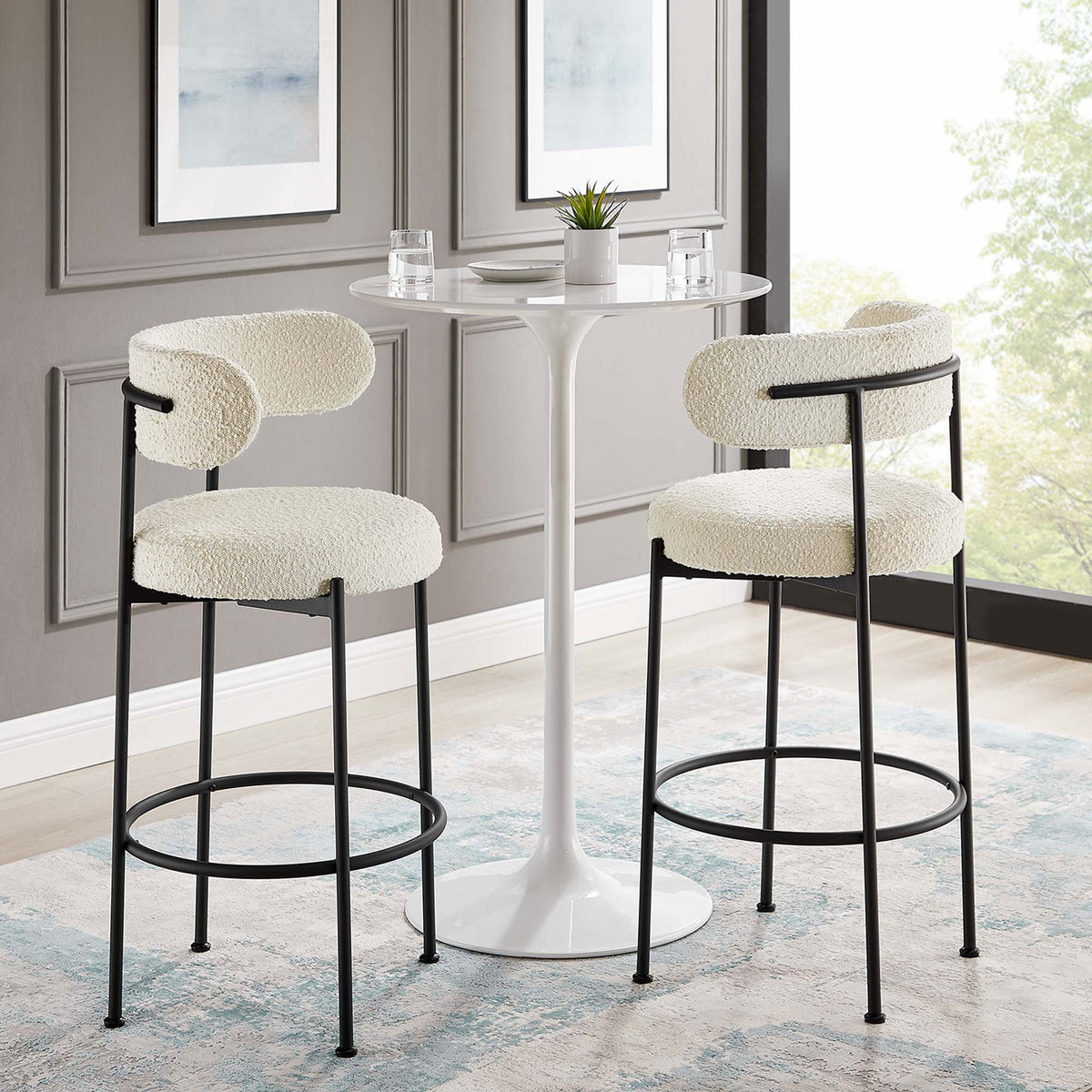 Pair of bar stools completes a sleek cafe-inspired nook. || EEI-6520-IVO-BLK || front_angle_multi_room