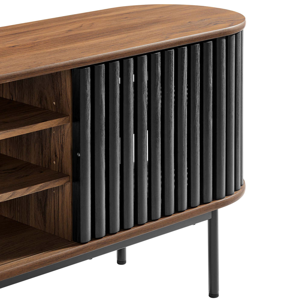 Detail of walnut media console showing smooth rounded top, black slatted doors, and slim metal leg || EEI-6522-WAL-BLK || detail_studio