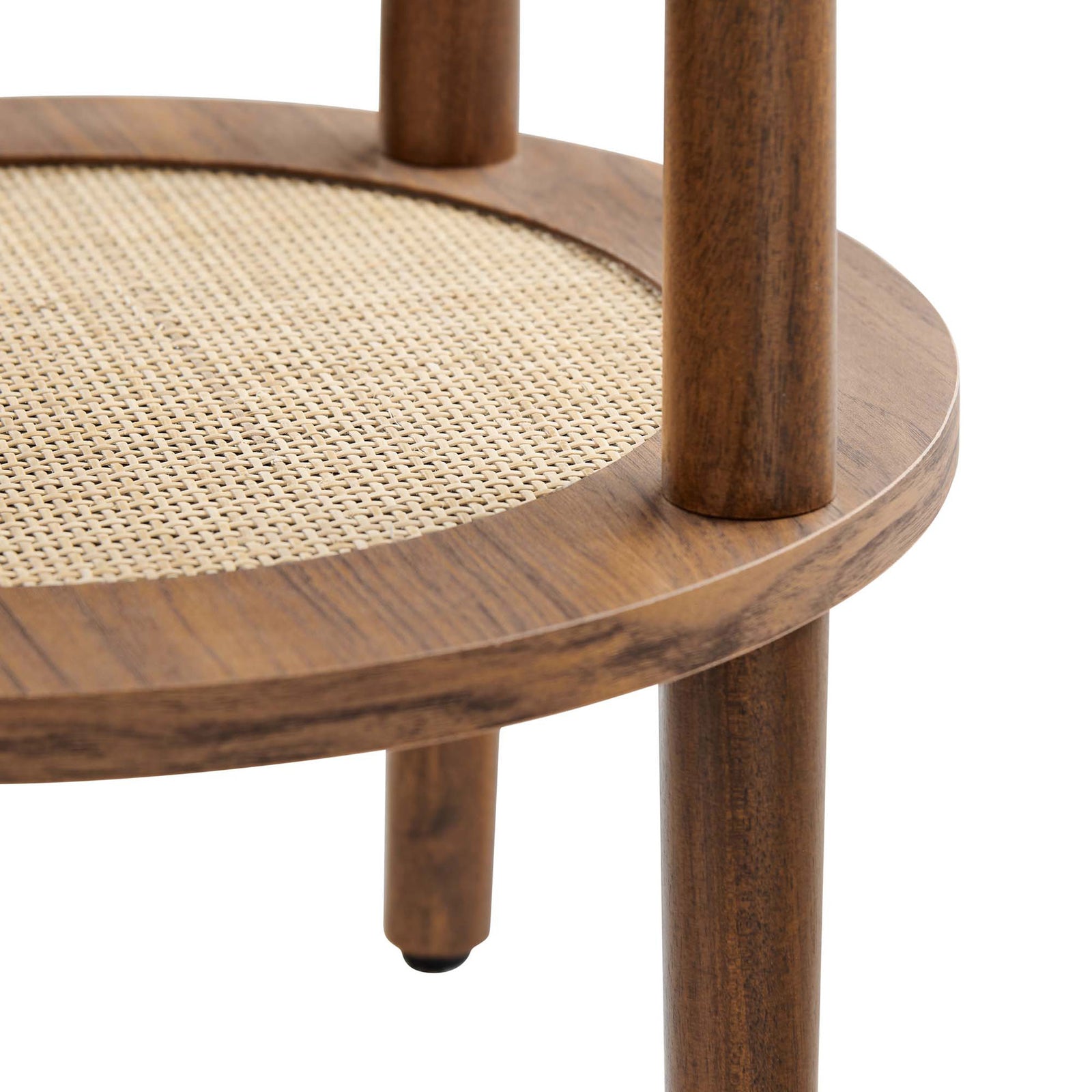 Woven rattan shelf framed by warm walnut wood grain and supported by cylindrical legs with floor-friendly caps || EEI-6527-WAL || detail_studio