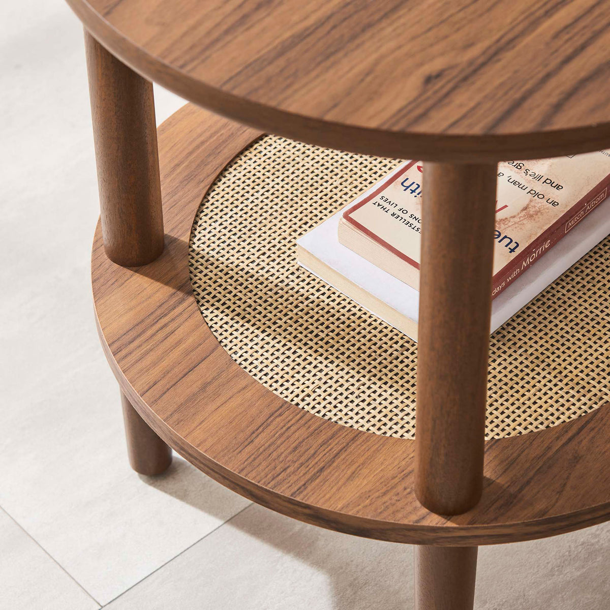 Walnut side table styled with books on the woven rattan shelf, bringing warm texture to a modern living space || EEI-6527-WAL || detail_room