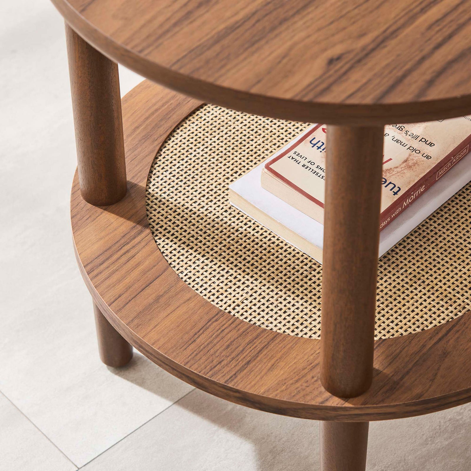 Walnut side table styled with books on the woven rattan shelf, bringing warm texture to a modern living space || EEI-6527-WAL || detail_room