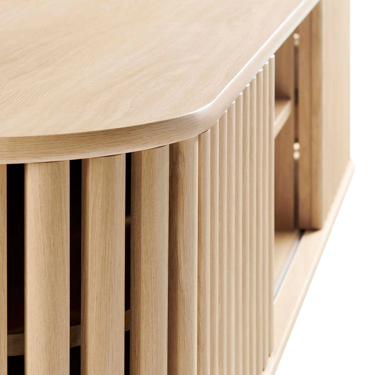 Detail of oak wall mounted console with rounded top edge and timber style slatted door design || EEI-6528-OAK || detail_studio